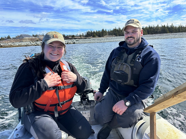 Alexis Saulnier and Luc Bilodeau leaving the mainland for North Brother